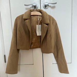 Saints and Secrets camel jacket